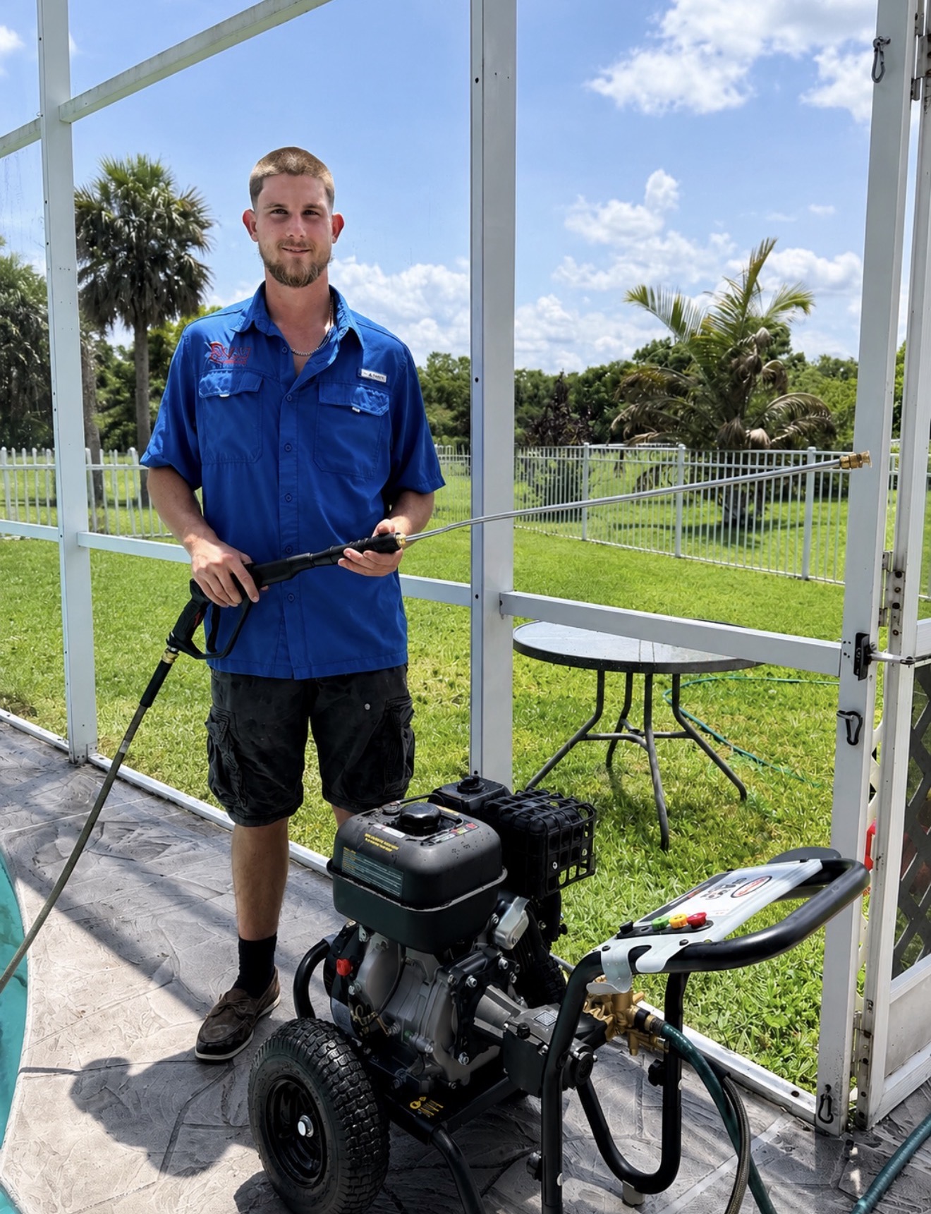 Exalt Pressure Washing technician on the job